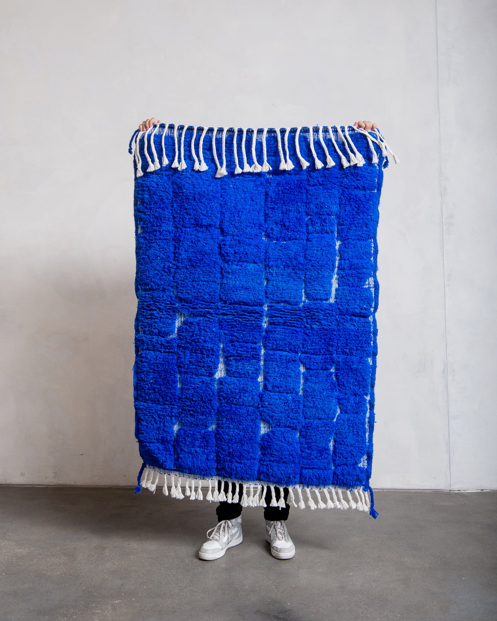 Modern, designer, handcrafted Berber rug from Morocco. Beniourain carpet with beautiful colours and patterns and fluffy wool texture.